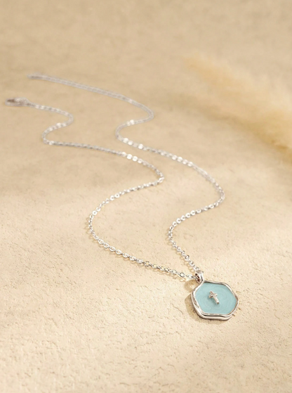 Petite enamel cross necklace in gold, shown close up — view 19