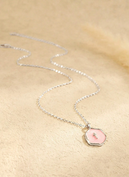 Petite enamel cross necklace in gold, shown close up — view 4