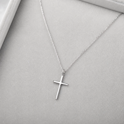 Simple cross pendant necklace on a fine chain — view 2